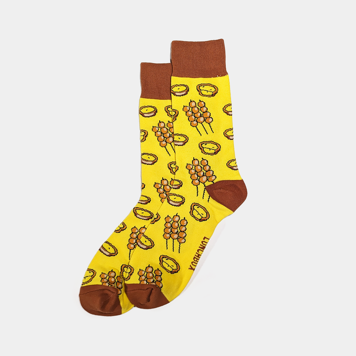 'Flavours of Hong Kong' socks featuring curry fish balls and egg tart designs.